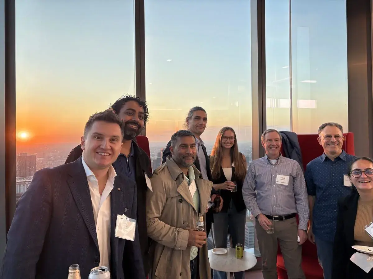 Founders and mentors at an evening reception overlooking Chicago