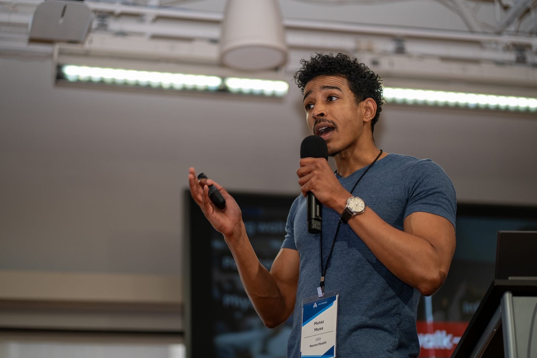 A portfolio founder pitching on stage